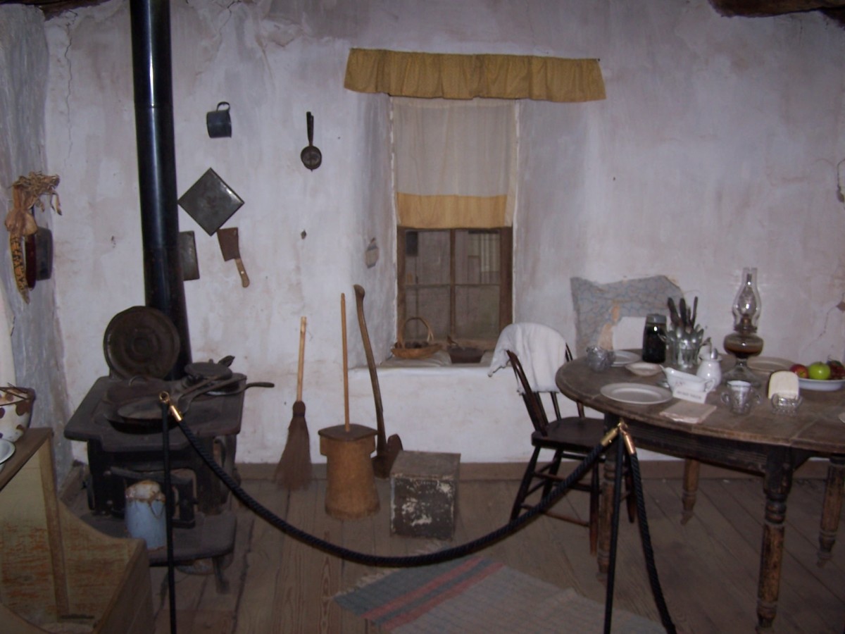 The interior of a sod home is re-created in this picture.