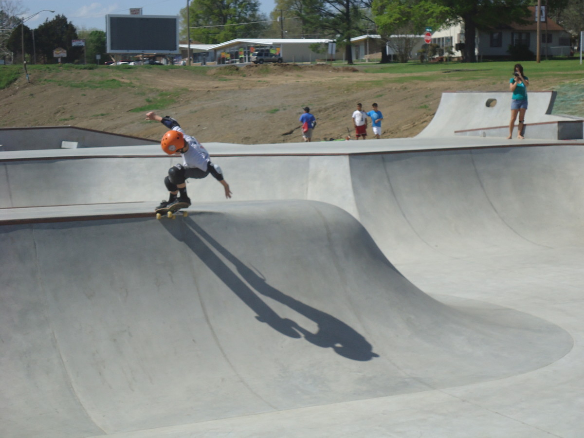 Oklahoma Skate Parks: Skater competing in the Oklahoma Jam at Poteau's Off Broadway Skatepark Oklahoma Skate Parks: Skater competing in the Oklahoma Jam at Poteau's Off Broadway Skatepark