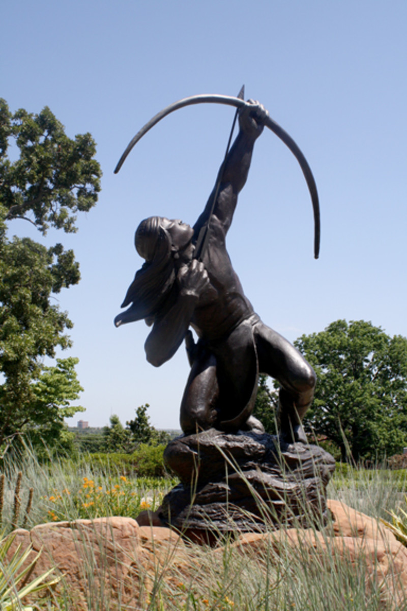 Museums in Tulsa: "Sacred Rain Arrow," a 1998 bronze sculpture by Allan Houser (Chiricahua Apache), at the Gilcrease Museum in Tulsa, Oklahoma Museums in Tulsa: "Sacred Rain Arrow," a 1998 bronze sculpture by Allan Houser (Chiricahua Apache), at the Gilcrease Museum in Tulsa, Oklahoma