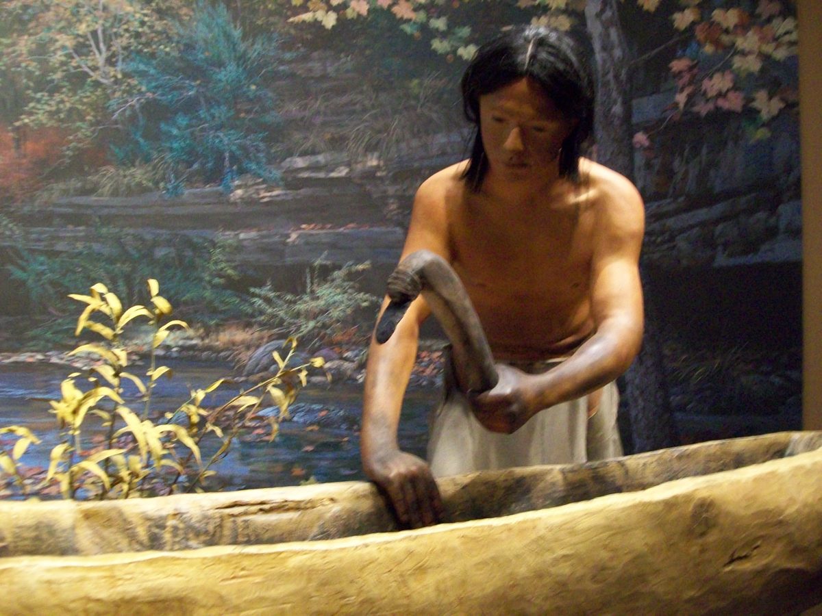 Illustration of an early Native American fashioning a dugout canoe. Illustration of an early Native American fashioning a dugout canoe.